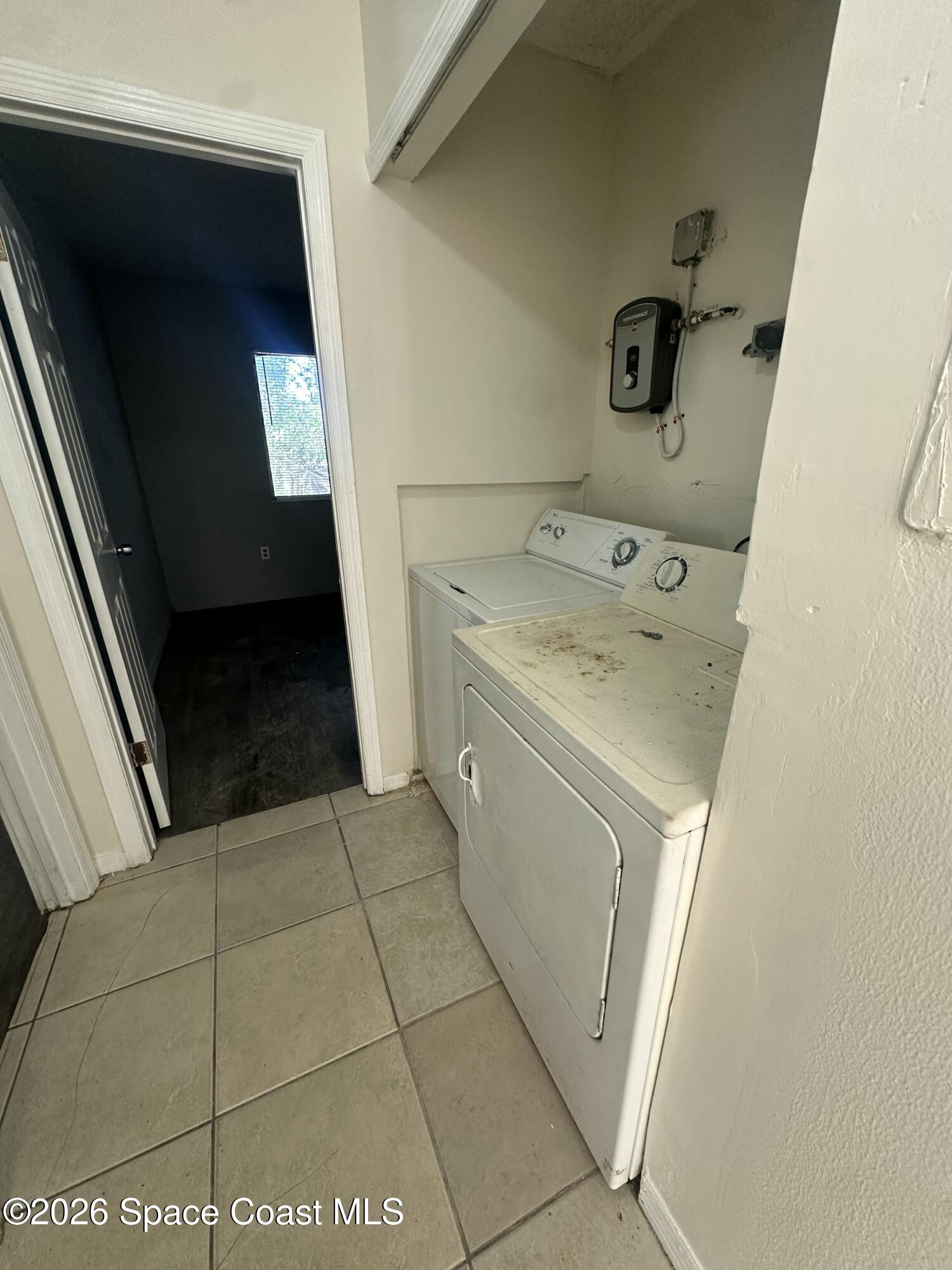 555 Rock Pit Road Titusville, FL 32796 - Photo 6 of 10 Washer/Dryer Area