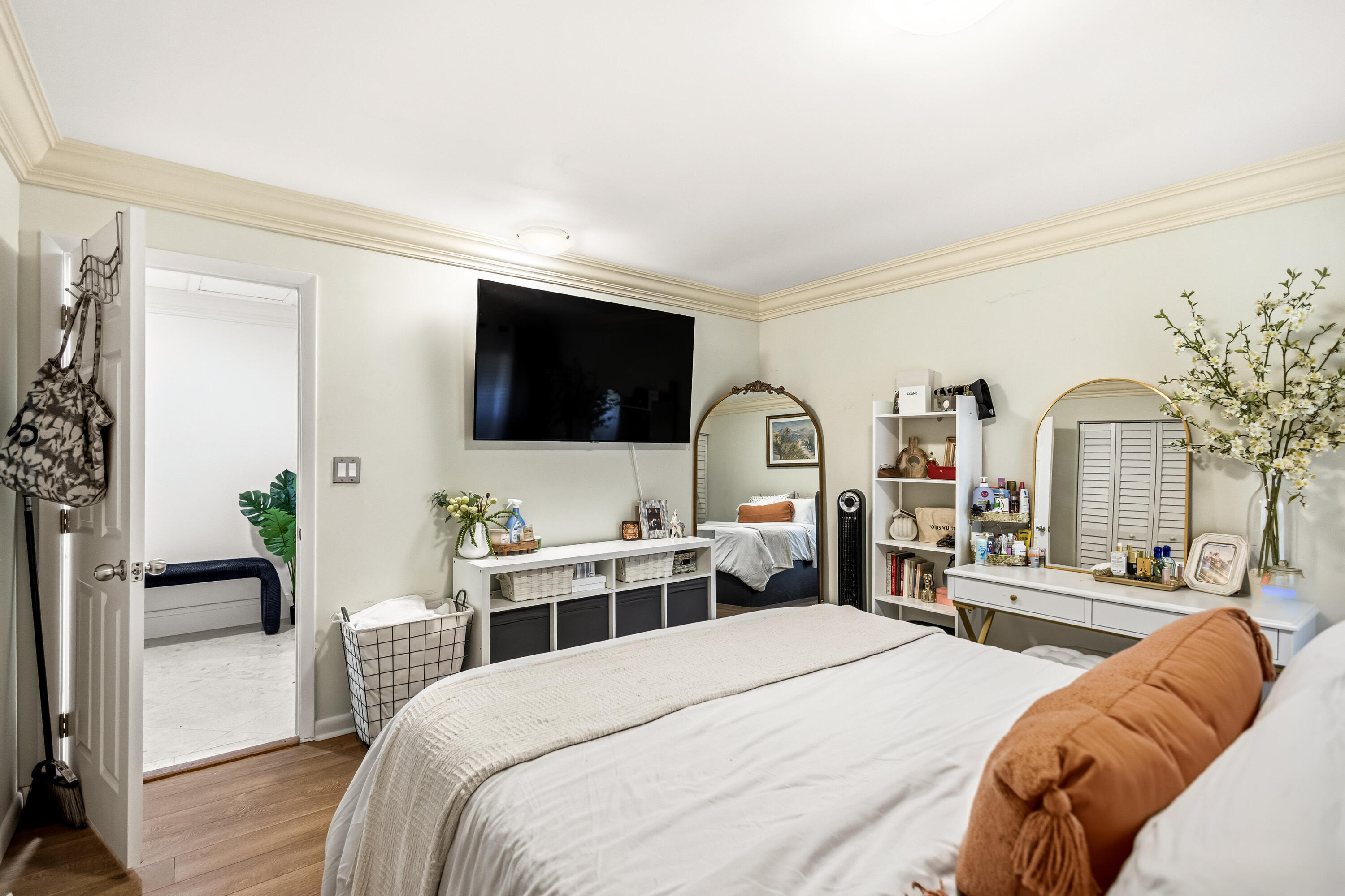 5223 Deerhurst Crescent Circle Boca Raton, FL 33486 - Photo 39 of 51 a bedroom with a bed and a flat screen tv