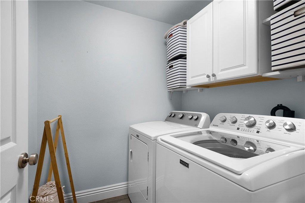 7 Herrick Street Ladera Ranch, CA 92694 - Photo 12 of 25 Interior laundry with storage cabinetry