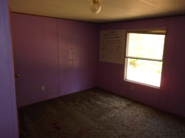 3152 Upper River Road Macon, GA 31211 - Photo 12 of 12 an empty room with a window