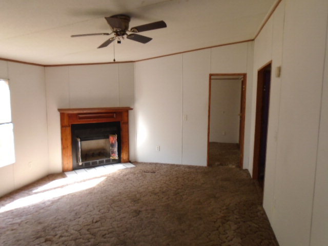 3152 Upper River Road Macon, GA 31211 - Photo 8 of 12 a view of empty room with fireplace