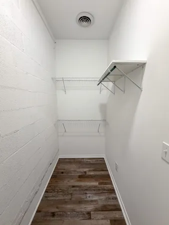 a view of a room with racks on the wall