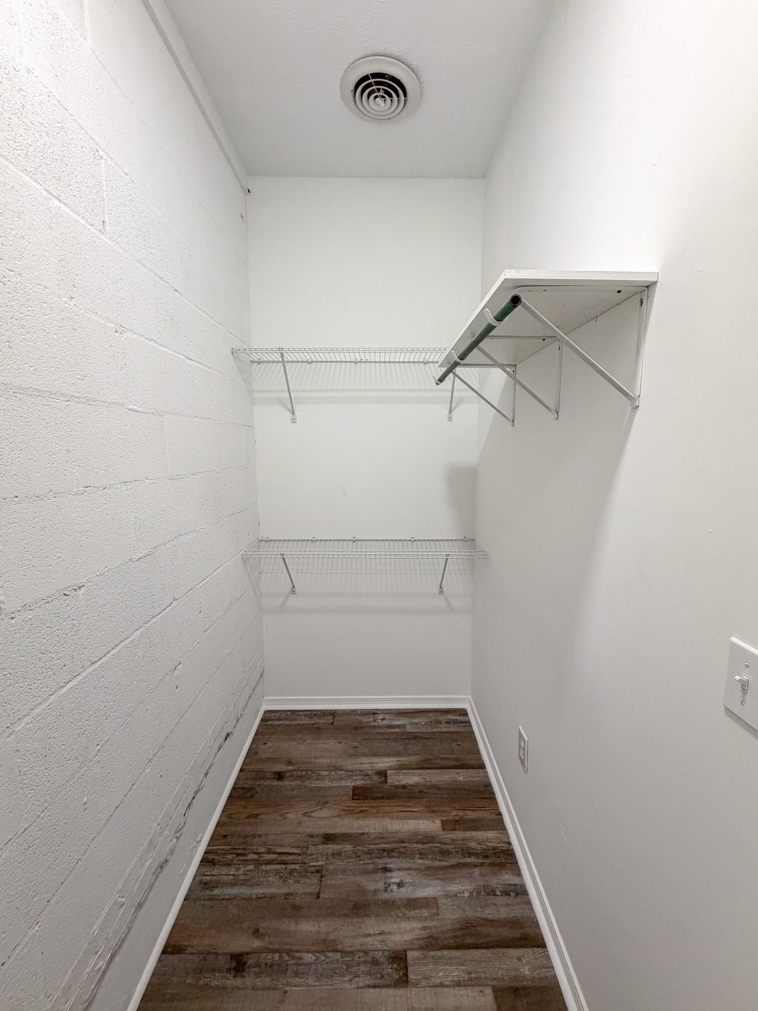 109 East Quitman Street Iuka, MS 38852 - Photo 5 of 6 a view of a room with racks on the wall