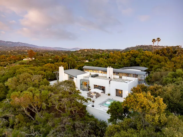 a view of a city with a building in the background