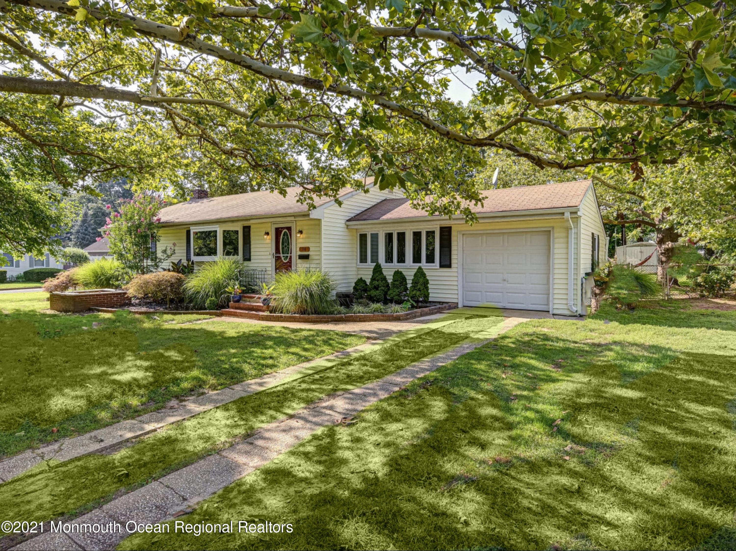 116 Bethany Road Hazlet, NJ 07730 - Photo 1 of 30 a front view of house with yard and green space