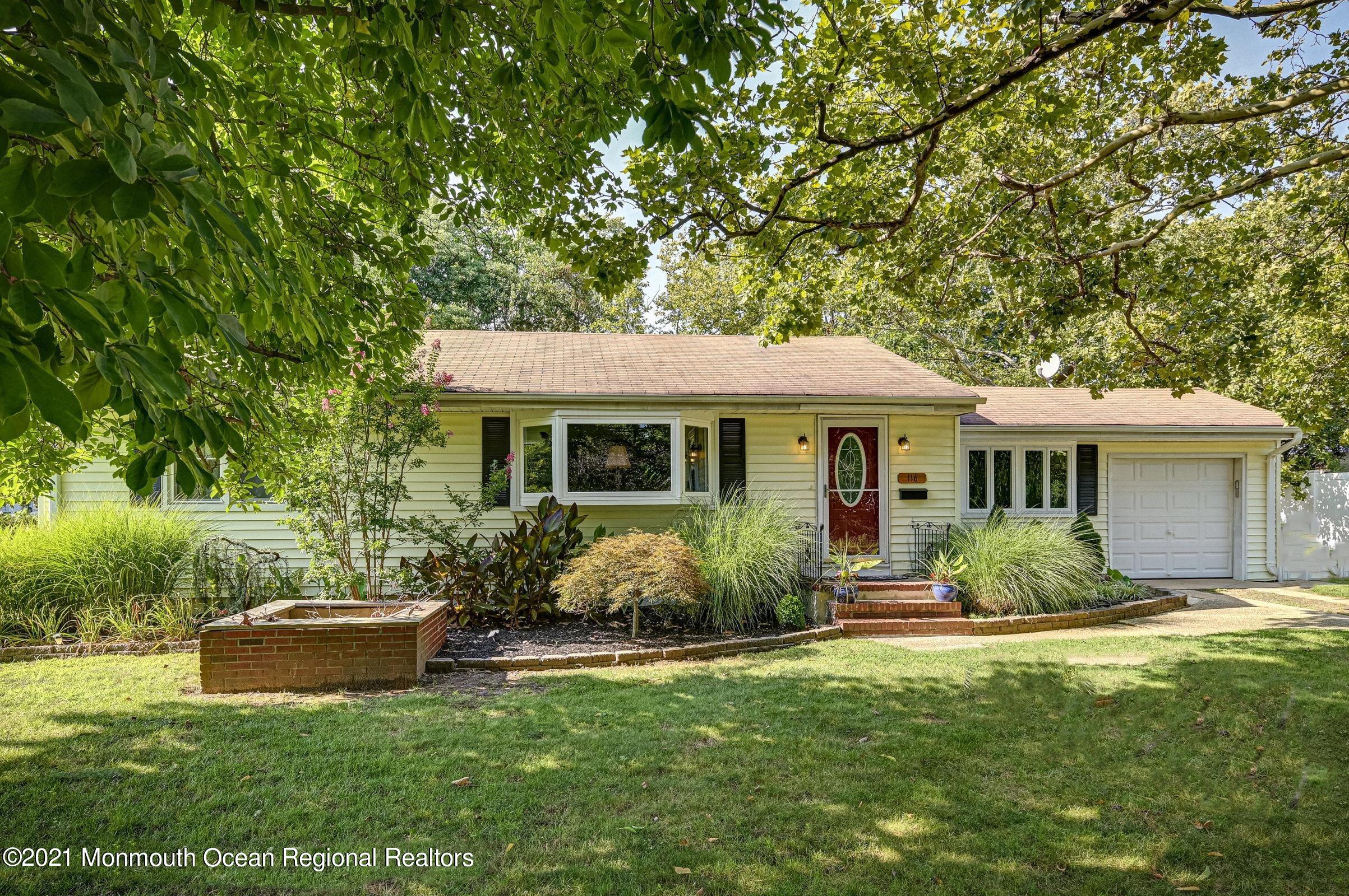 116 Bethany Road Hazlet, NJ 07730 - Photo 2 of 30 a front view of a house with garden