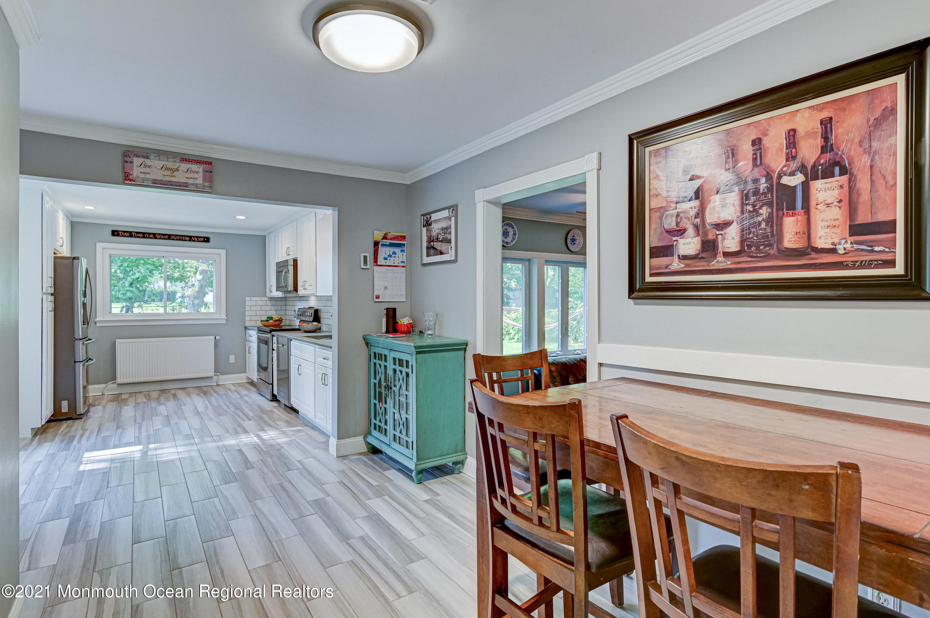 116 Bethany Road Hazlet, NJ 07730 - Photo 12 of 30 a view of a livingroom with furniture wooden floor and windows