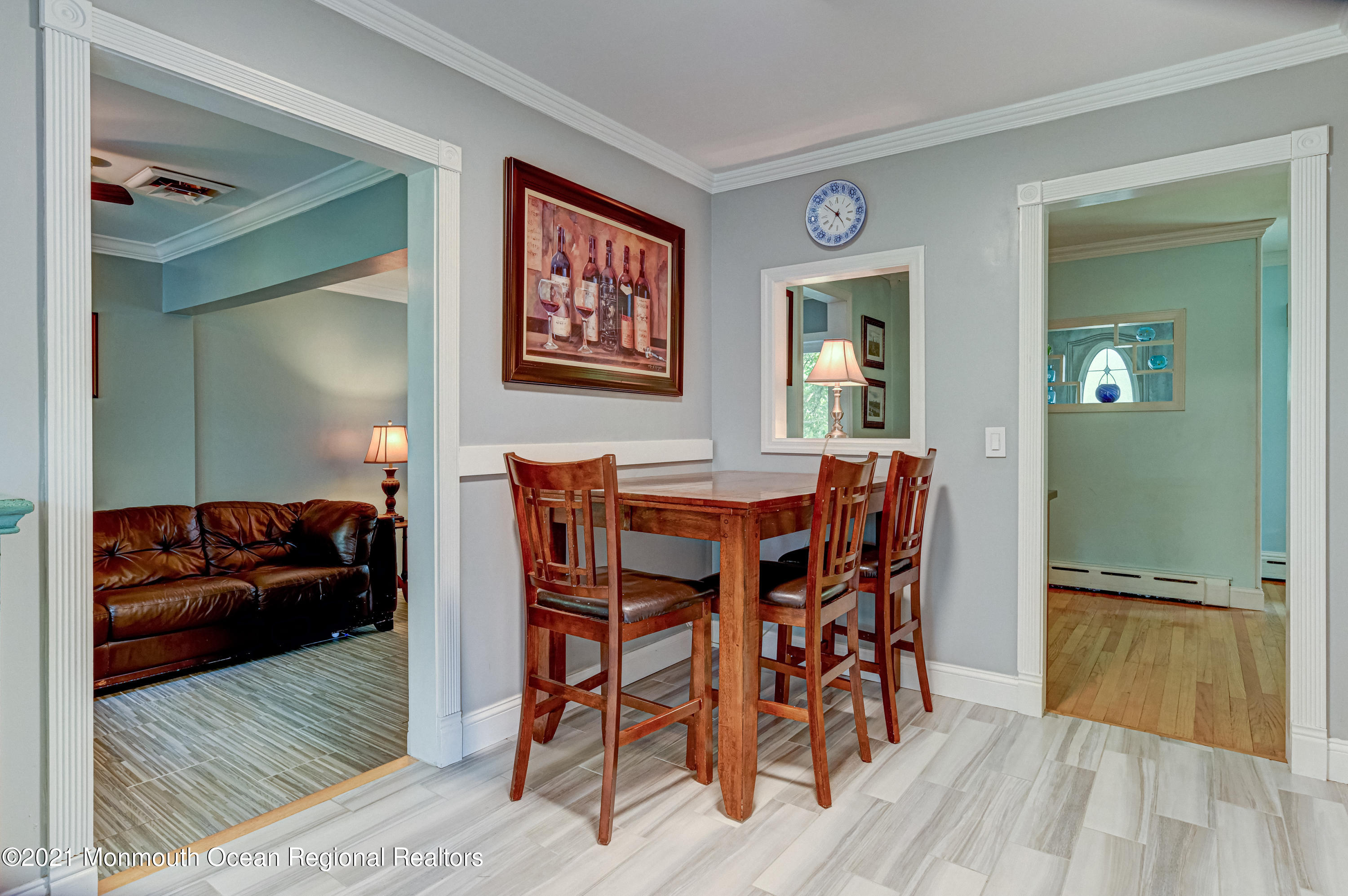 116 Bethany Road Hazlet, NJ 07730 - Photo 13 of 30 a view of a dining room with furniture and wooden floor