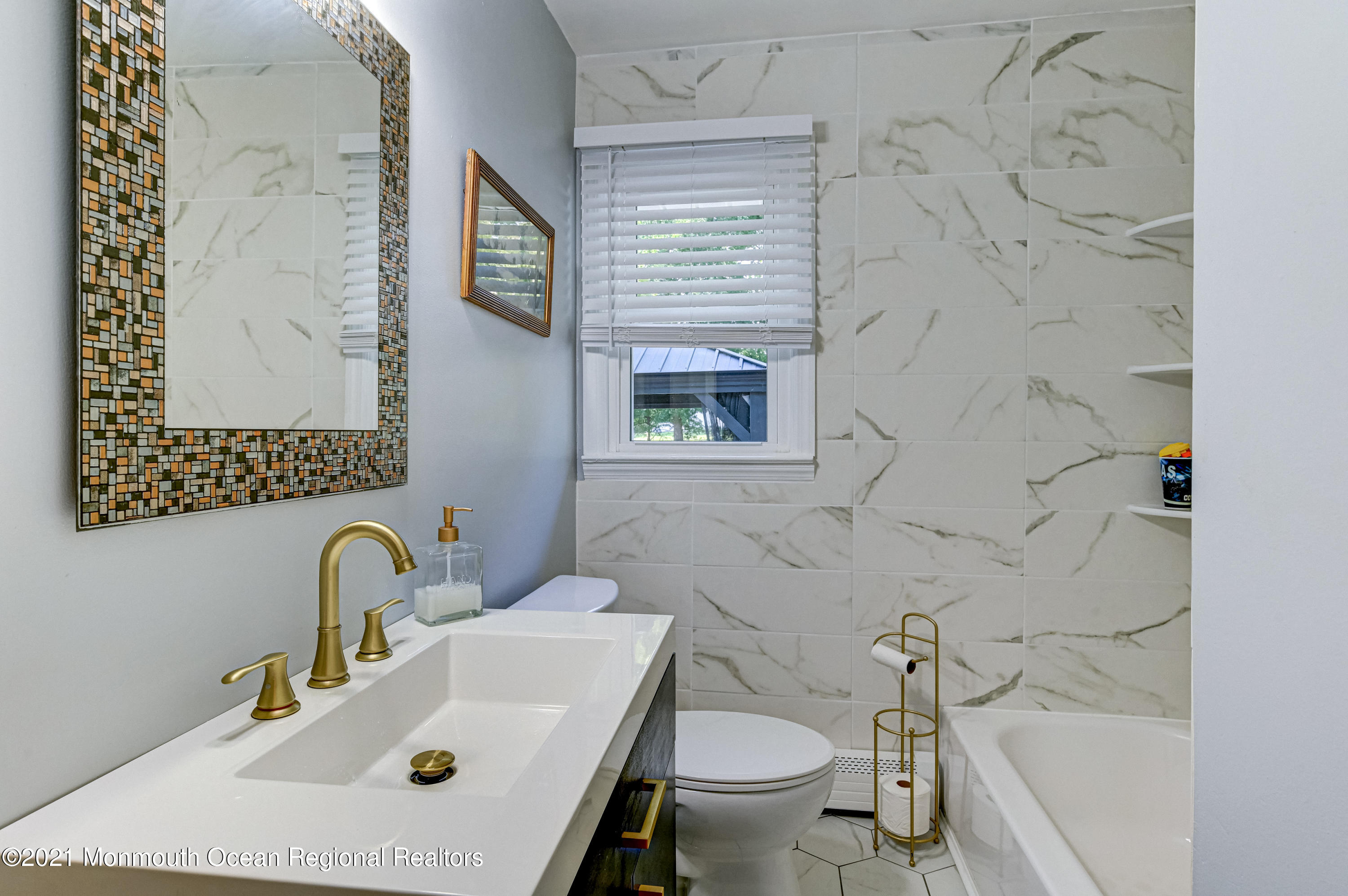 116 Bethany Road Hazlet, NJ 07730 - Photo 18 of 30 a bathroom with a sink and a toilet