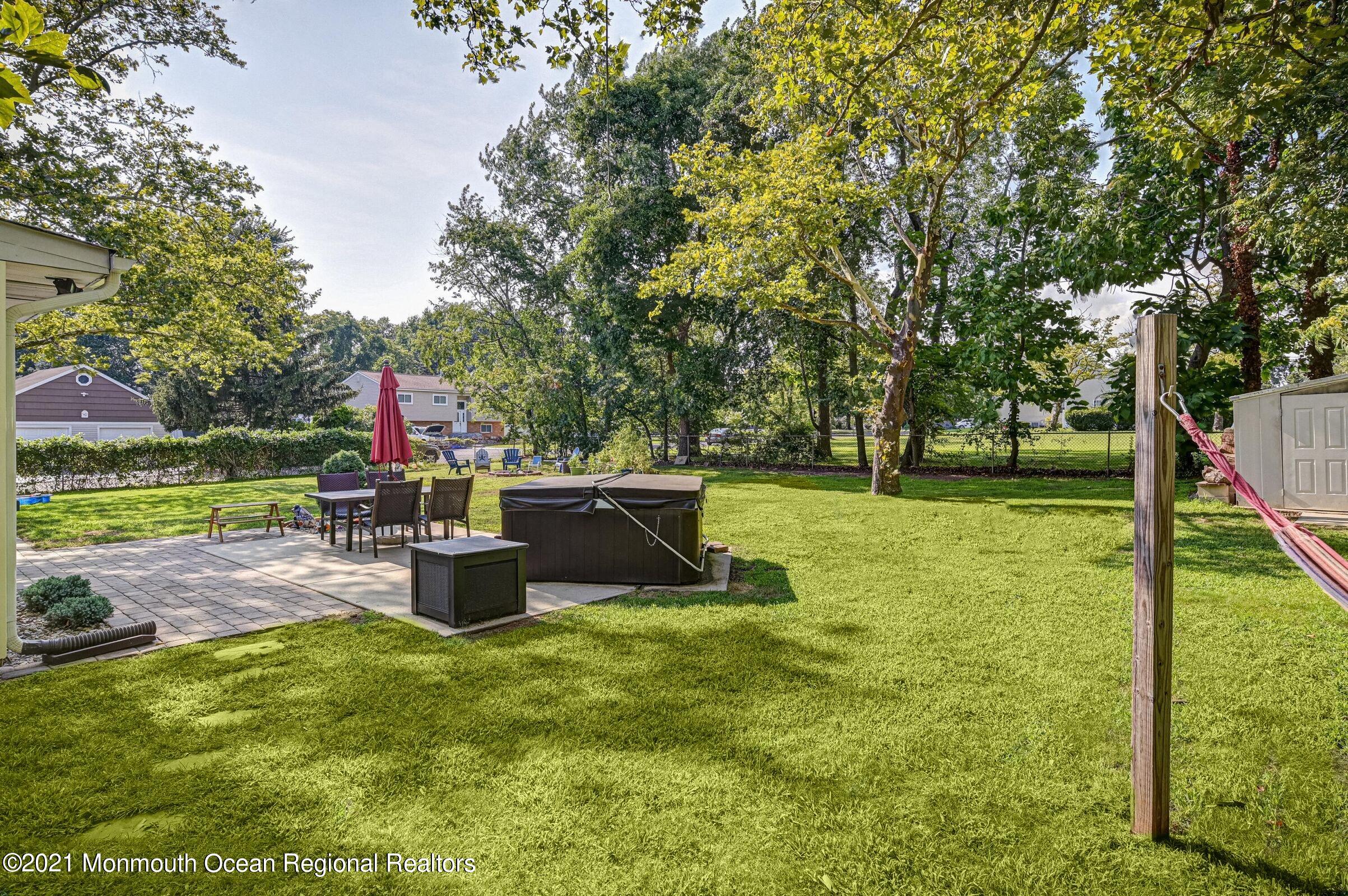 116 Bethany Road Hazlet, NJ 07730 - Photo 25 of 30 a view of a garden with a slide