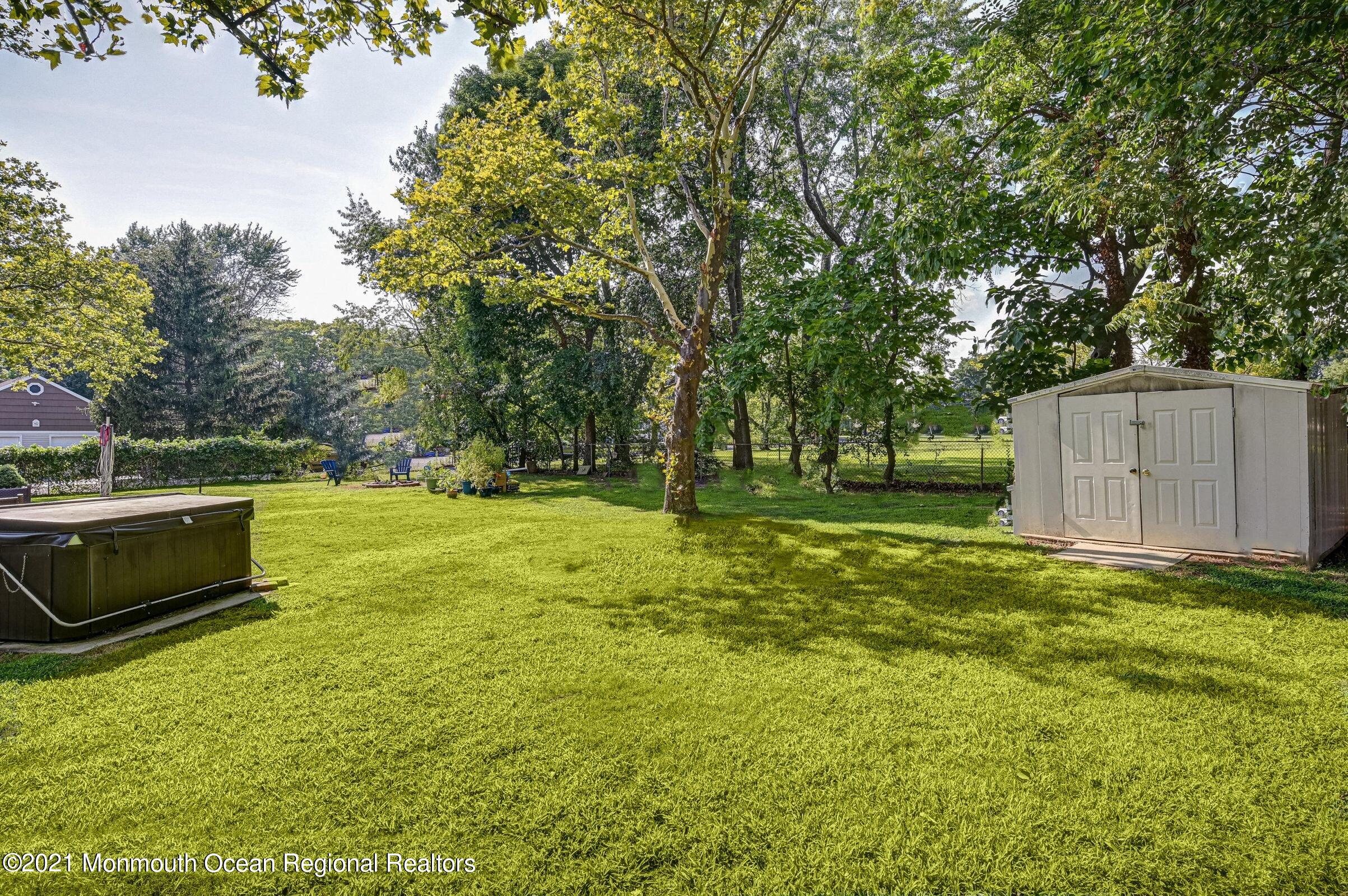 116 Bethany Road Hazlet, NJ 07730 - Photo 26 of 30 a view of a garden with trees