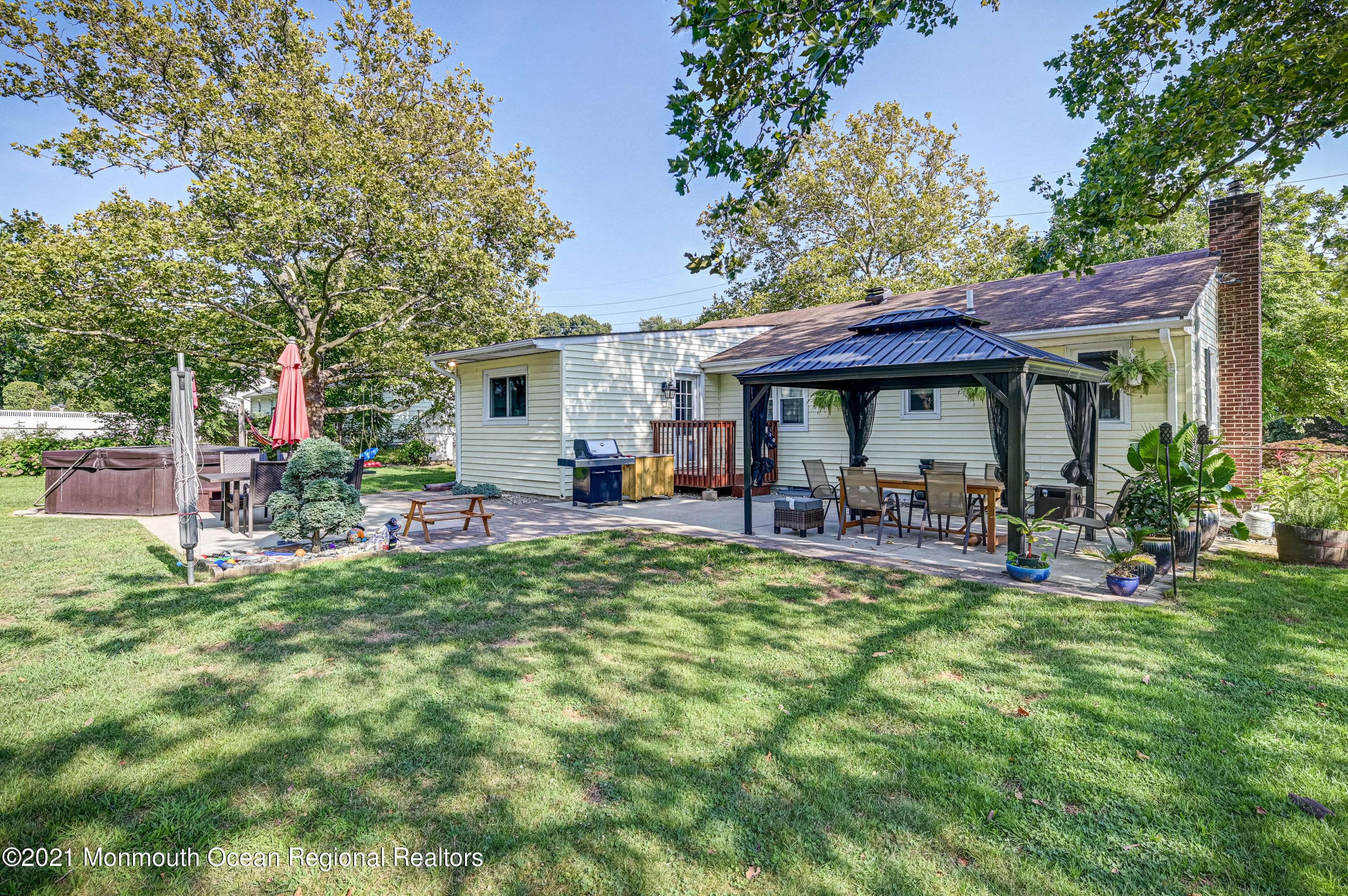 116 Bethany Road Hazlet, NJ 07730 - Photo 28 of 30 a view of a house with backyard porch and sitting area