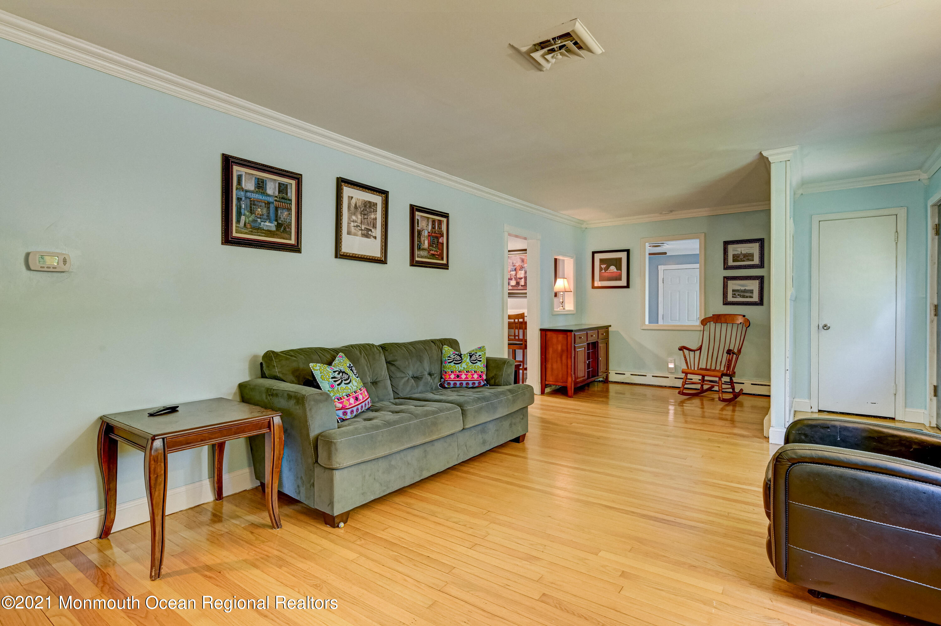 116 Bethany Road Hazlet, NJ 07730 - Photo 5 of 30 a living room with furniture and a wooden floor