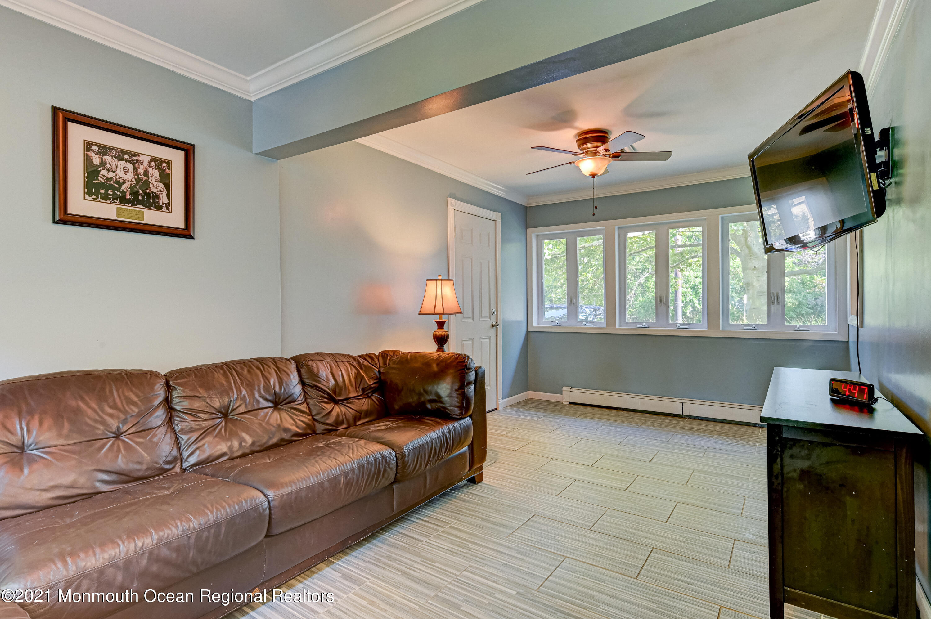 116 Bethany Road Hazlet, NJ 07730 - Photo 6 of 30 a living room with furniture and a flat screen tv