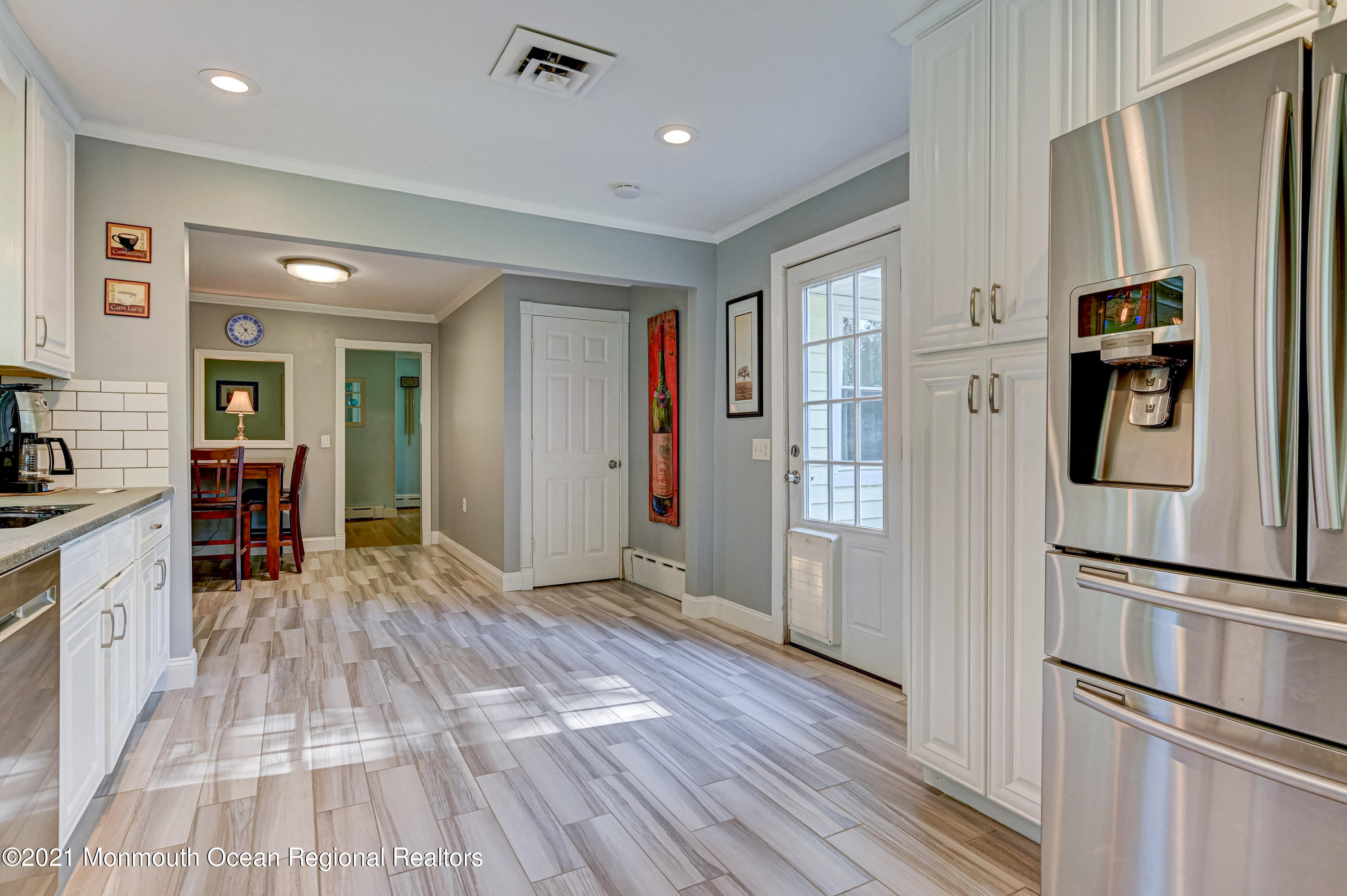 116 Bethany Road Hazlet, NJ 07730 - Photo 10 of 30 a view of kitchen with stainless steel appliances granite countertop cabinets and wooden floor