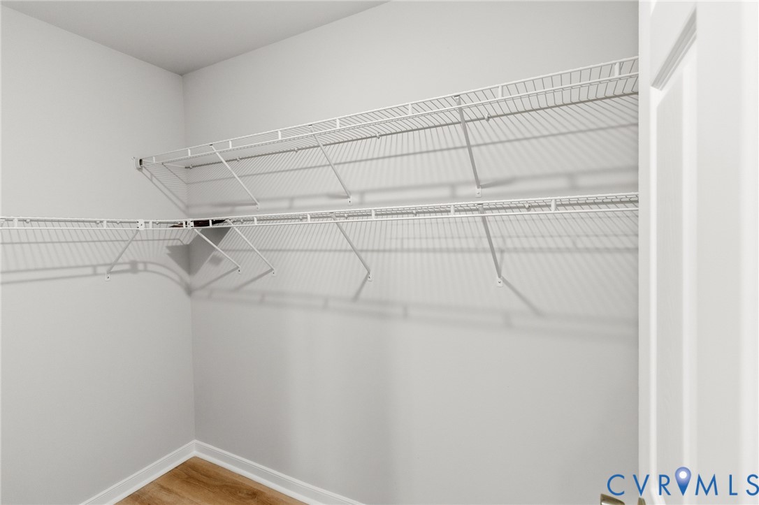 1430 Decatur Street Richmond, VA 23224 - Photo 26 of 37 Interior closet featuring wire shelving and wood-f