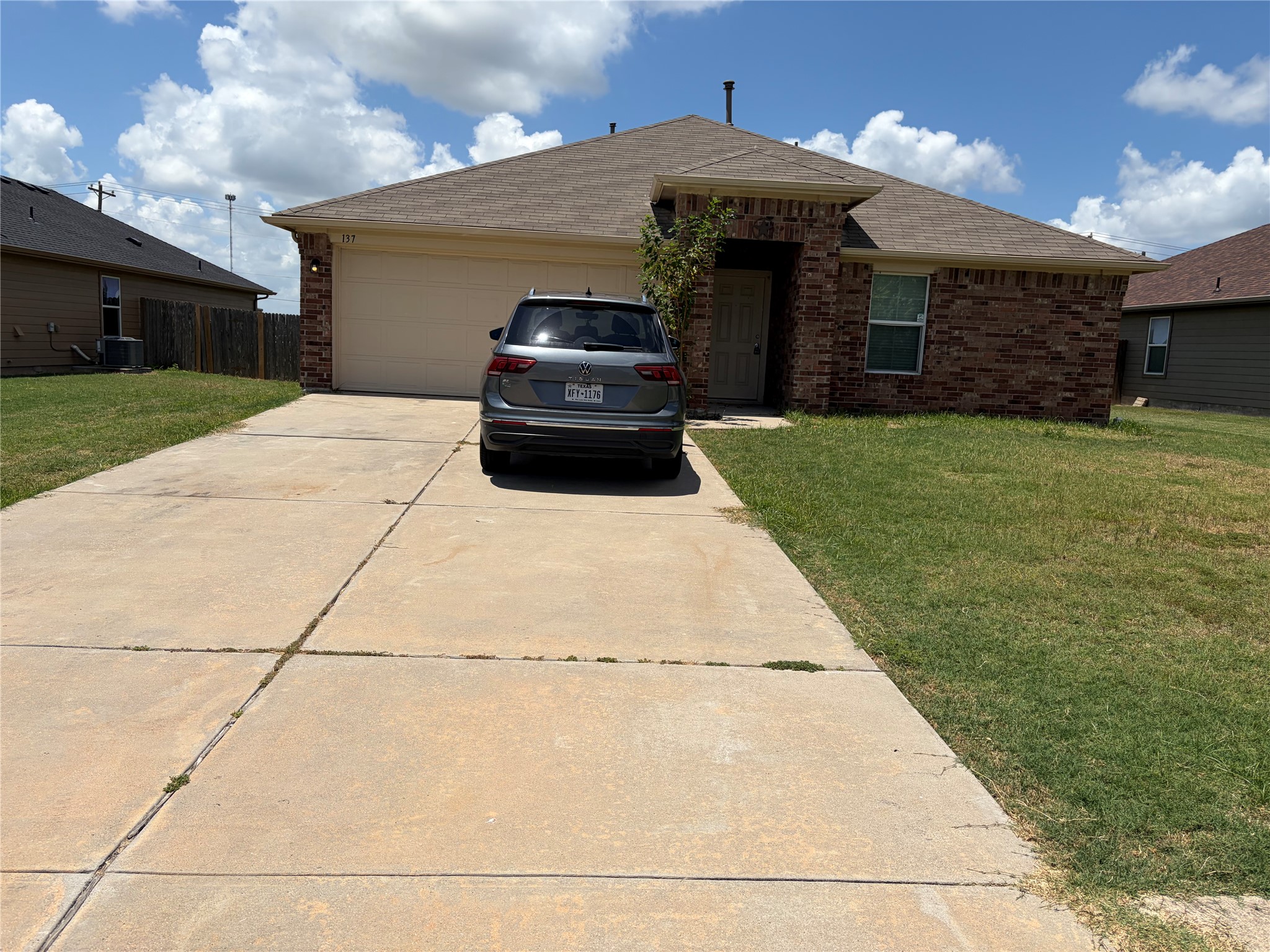 137 Rafe Court Kyle, TX 78640 - Photo 1 of 8 A classic brick exterior and attached garage offer timeless curb appeal for this charming residence.