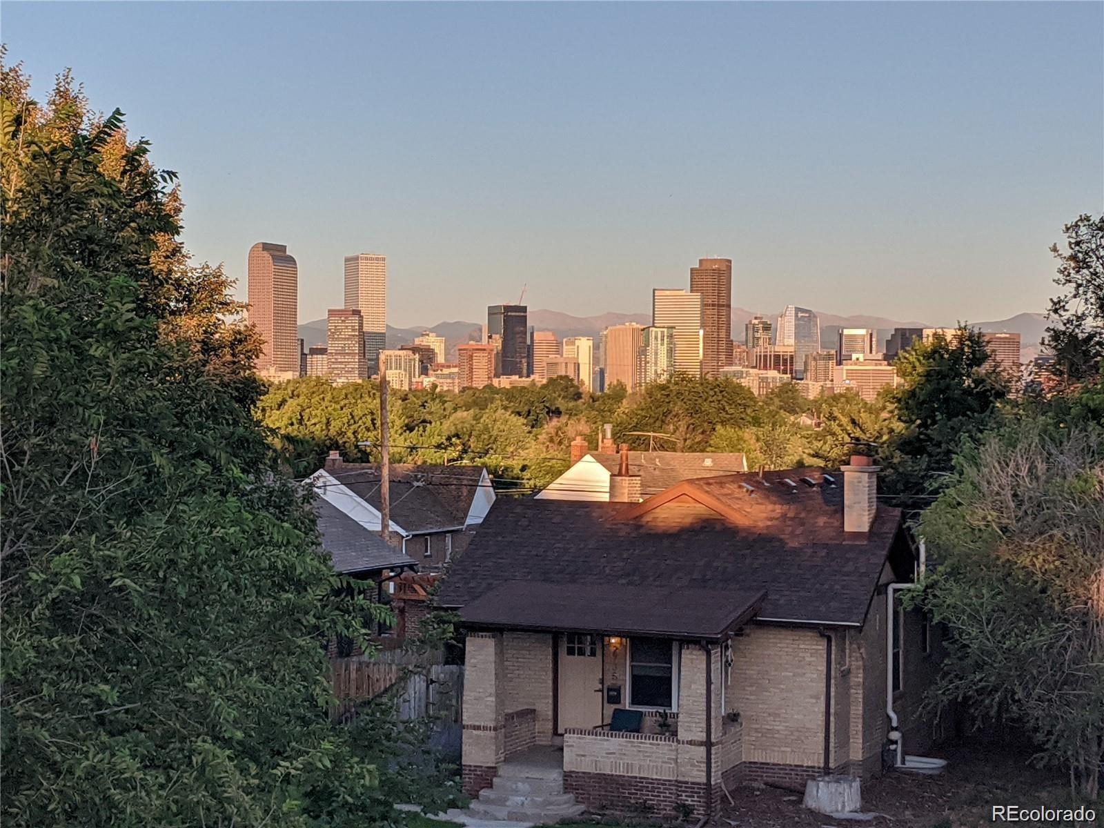 2740 Fillmore Street Denver, CO 80205 - Photo 28 of 45 a view of a city with tall buildings