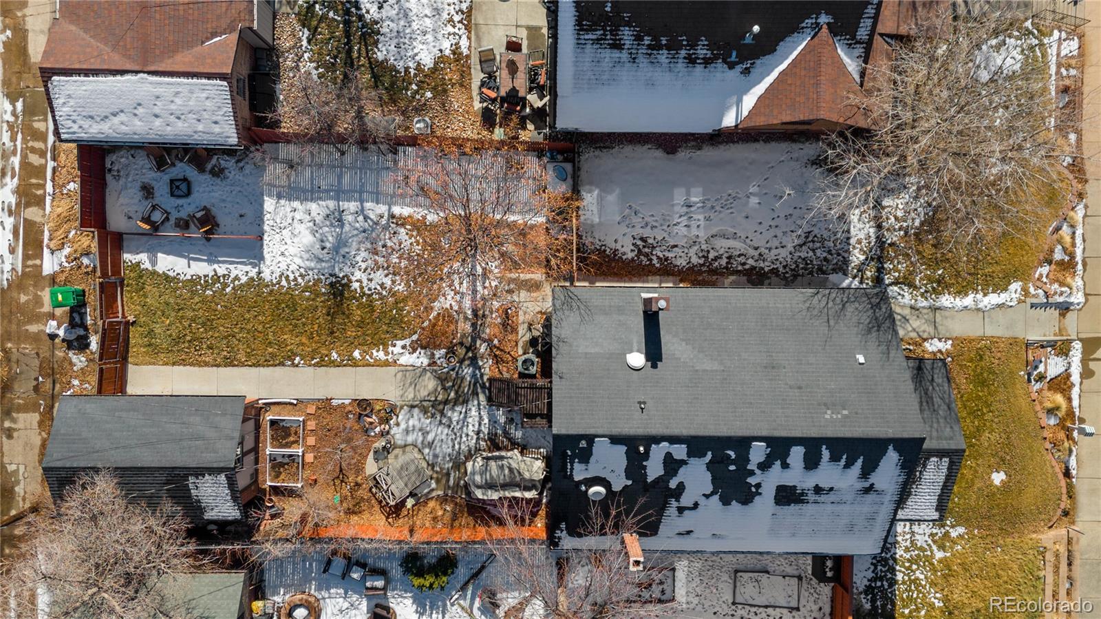 2740 Fillmore Street Denver, CO 80205 - Photo 45 of 45 a aerial view of a house with table and chairs