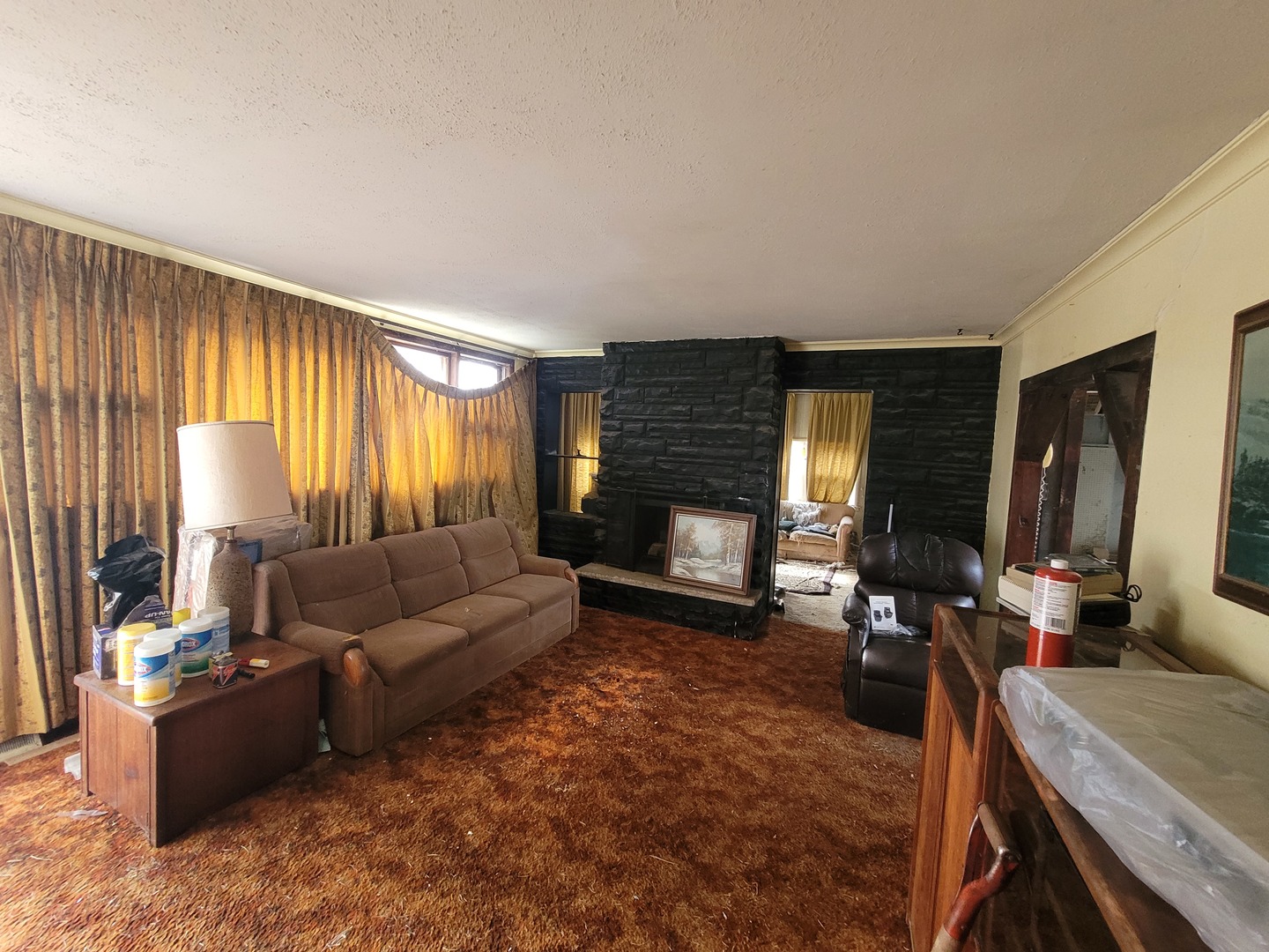 14340 Kostner Avenue Midlothian, IL 60445 - Photo 4 of 15 a living room with furniture window and a flat screen tv
