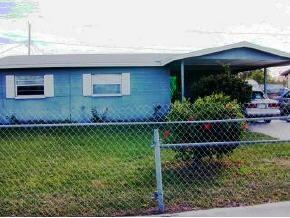 809815 Poplar Melbourne, FL 32901 - Photo 5 of 5 a view of a house with a backyard