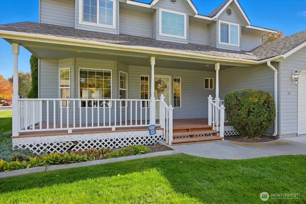 front view of a house with a yard