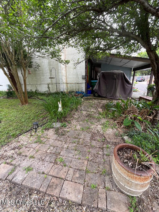 2501 Gulf Avenue, Unit 12 Gulfport, MS 39501 - Photo 32 of 38 side carport view