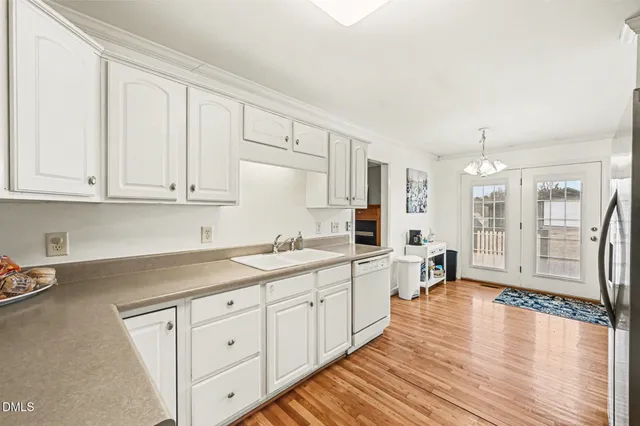 a kitchen with a refrigerator stove and microwave