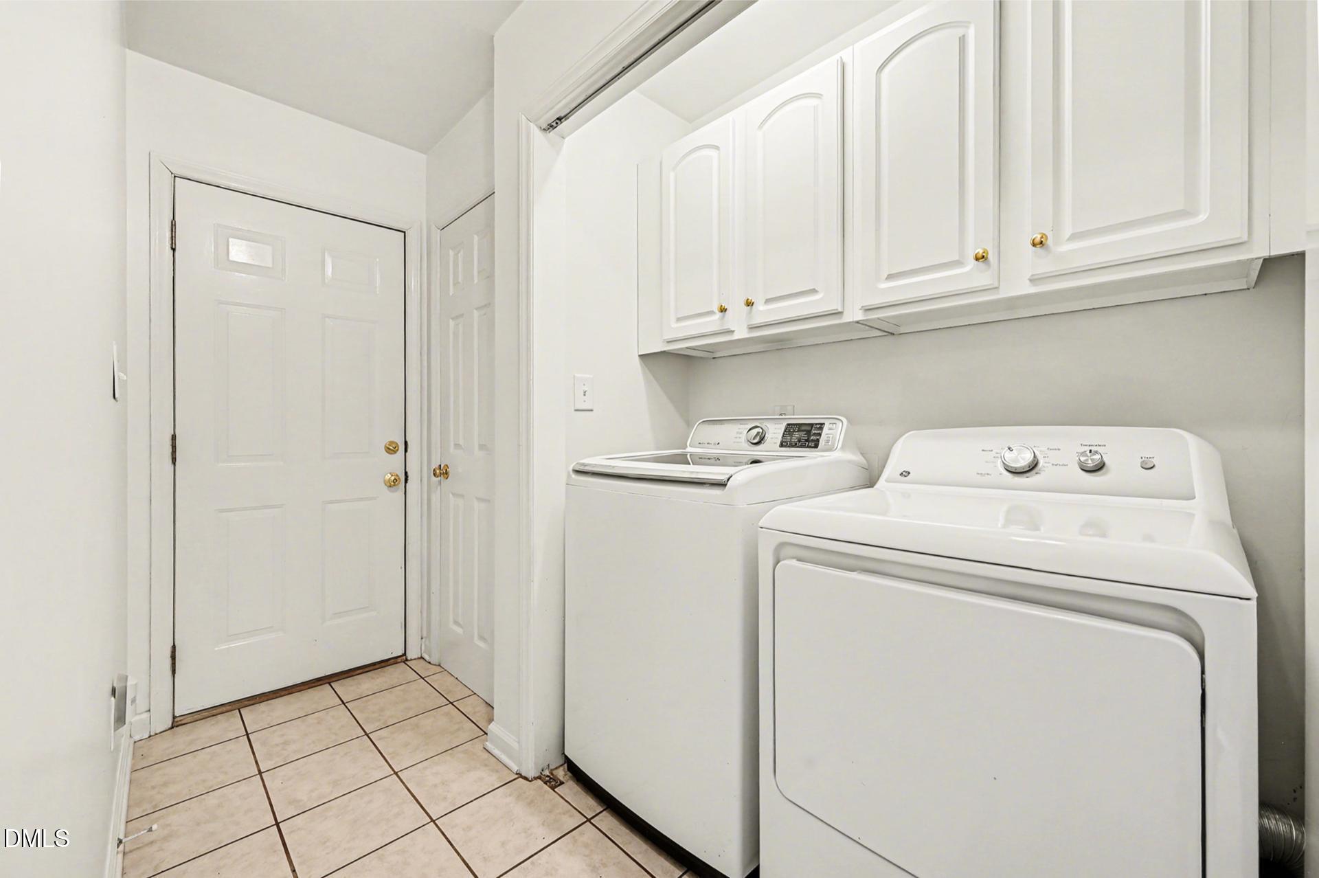 2070 Haw River Hopedale Road Burlington, NC 27217 - Photo 21 of 30 a utility room with dryer and washer