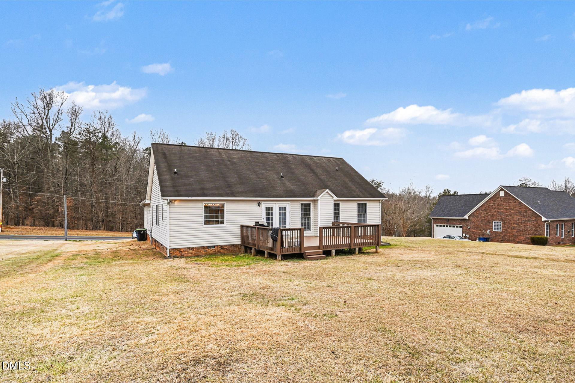 2070 Haw River Hopedale Road Burlington, NC 27217 - Photo 27 of 30 a view of a house with a yard