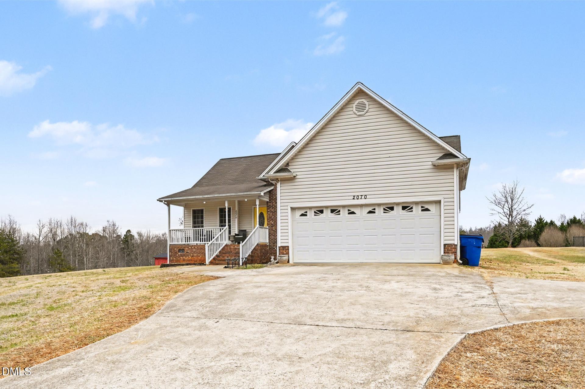2070 Haw River Hopedale Road Burlington, NC 27217 - Photo 2 of 30 a view of a house with a yard