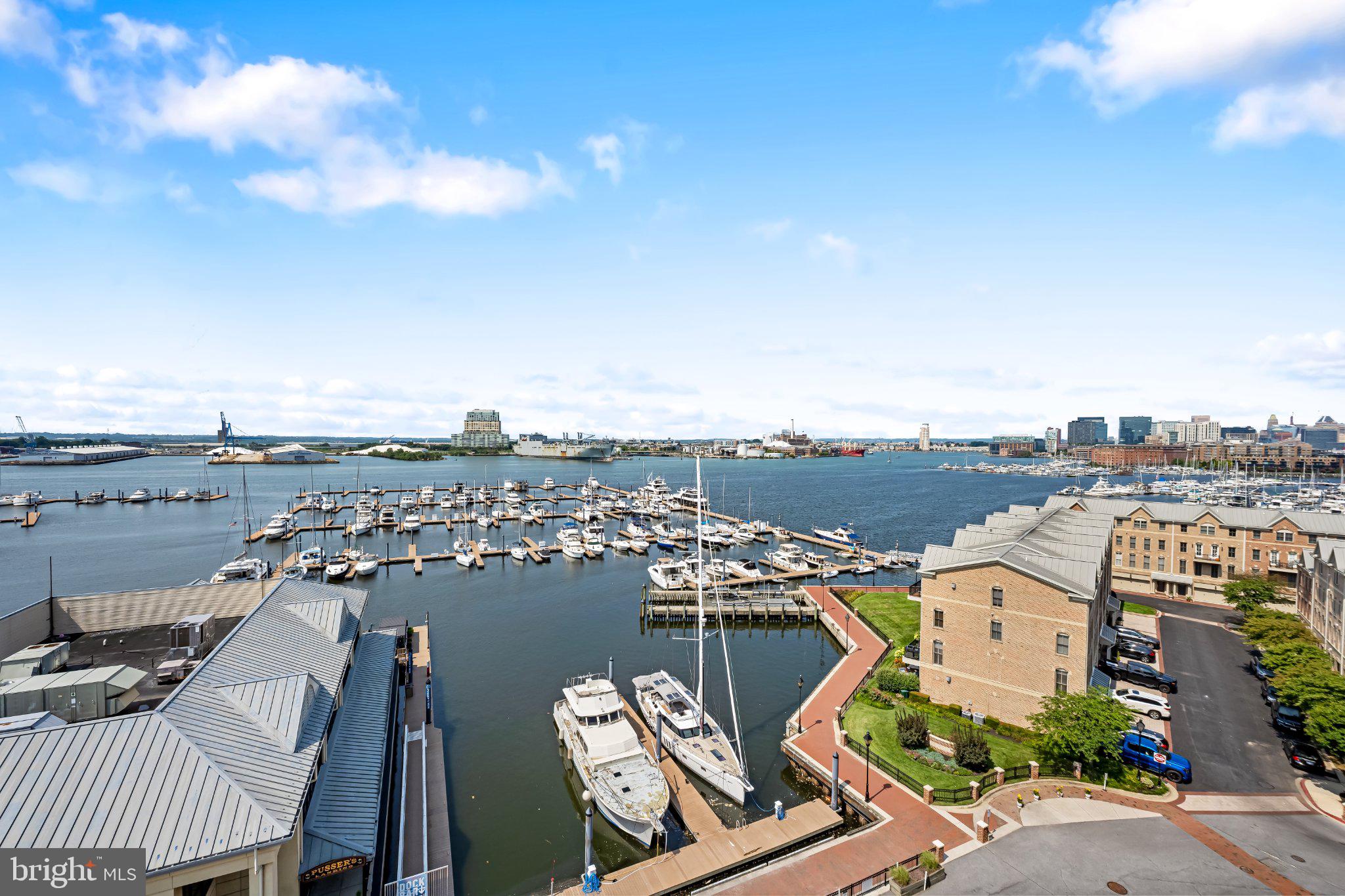2702 Lighthouse Point East, Unit 738 Baltimore, MD 21224 - Photo 18 of 33 Harbor views with serene waterscape.