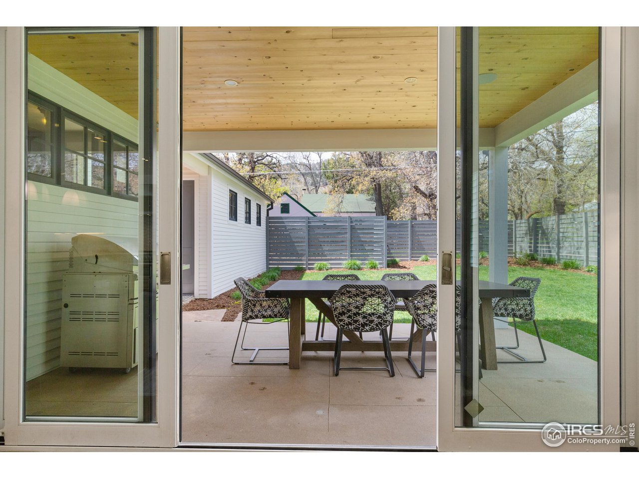3191 9th Street Boulder, CO 80304 - Photo 11 of 40 a balcony with table and chairs