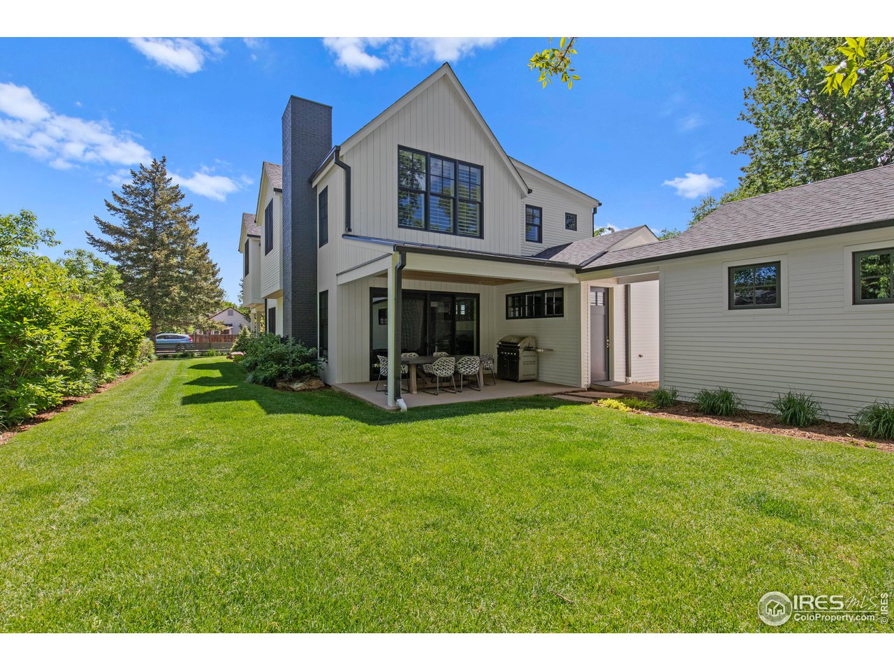 3191 9th Street Boulder, CO 80304 - Photo 12 of 40 a view of a house with back yard