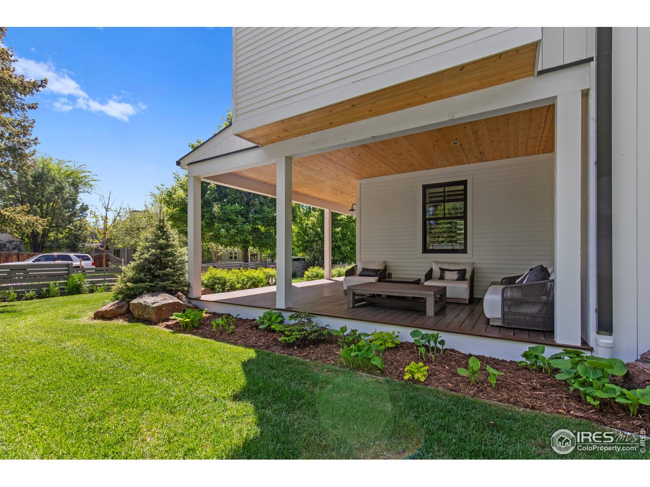 3191 9th Street Boulder, CO 80304 - Photo 13 of 40 a view of backyard with outdoor seating and green space