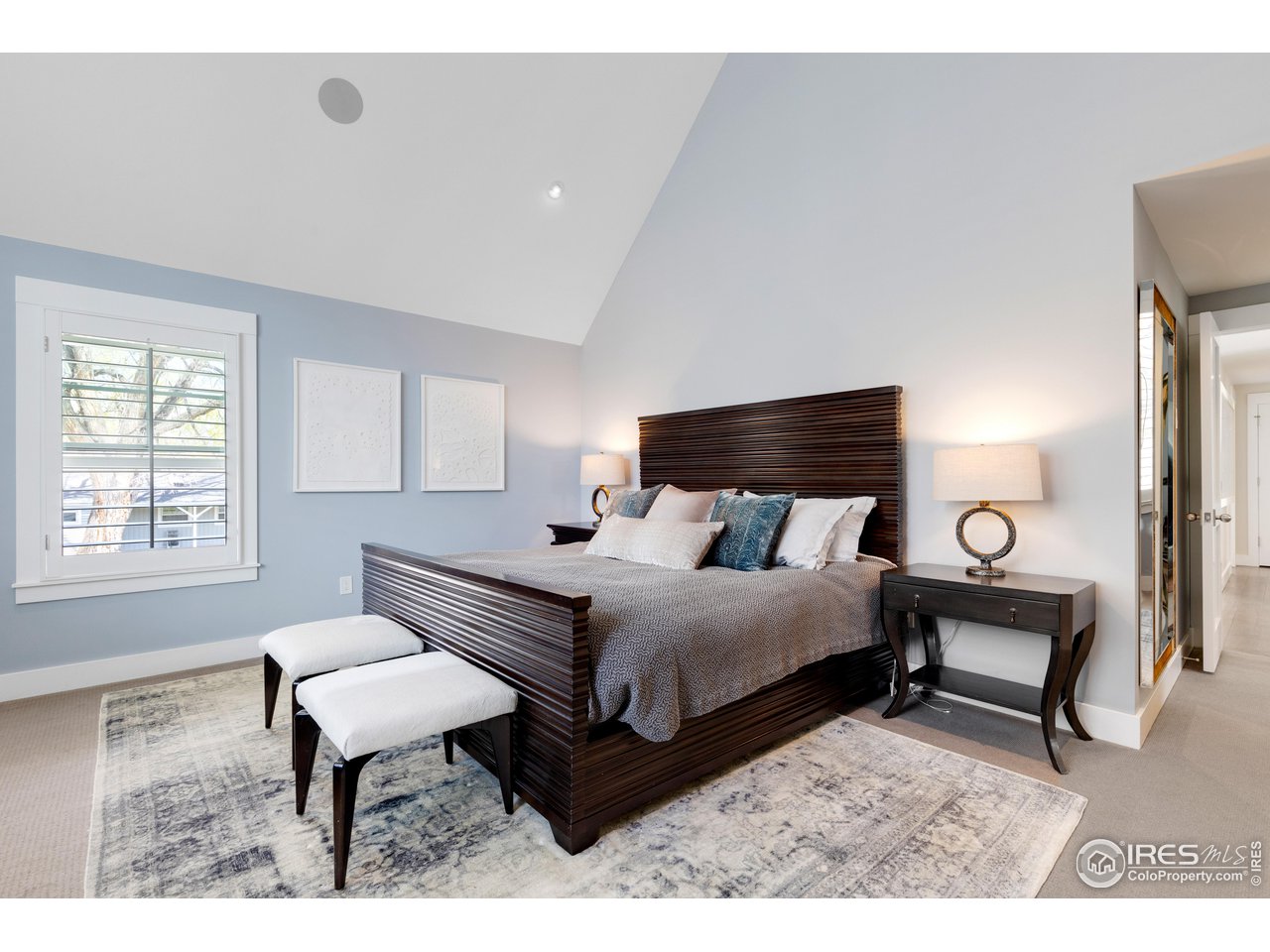 3191 9th Street Boulder, CO 80304 - Photo 20 of 40 a bedroom with a bed chair and window