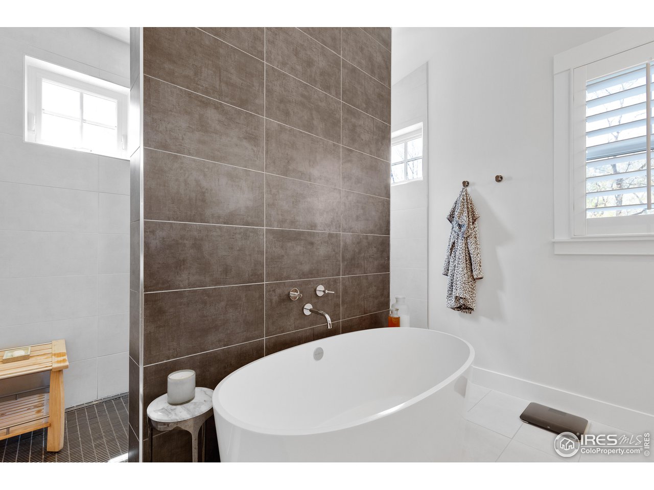 3191 9th Street Boulder, CO 80304 - Photo 23 of 40 a bathroom with a toilet and a shower