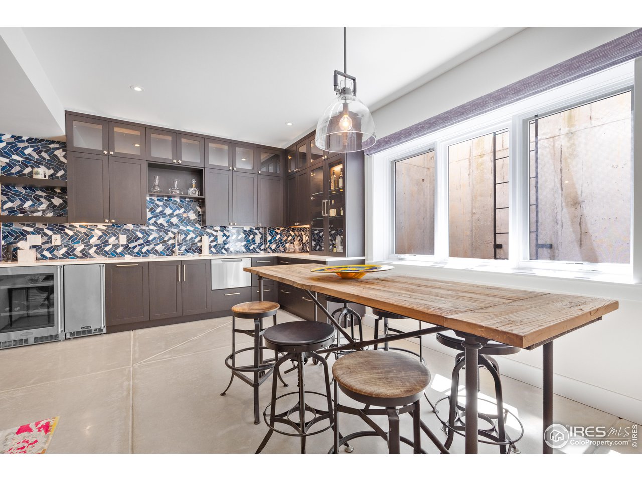3191 9th Street Boulder, CO 80304 - Photo 32 of 40 a view of a dining room with furniture and window