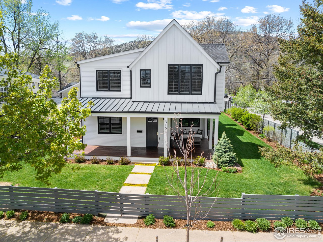 3191 9th Street Boulder, CO 80304 - Photo 37 of 40 a front view of a house with garden