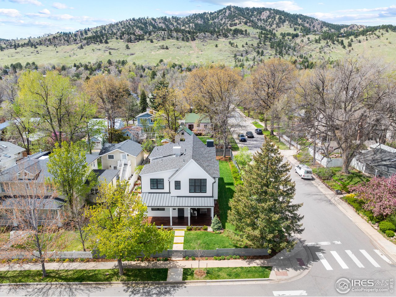 3191 9th Street Boulder, CO 80304 - Photo 40 of 40 a aerial view of a house with a big yard and large trees