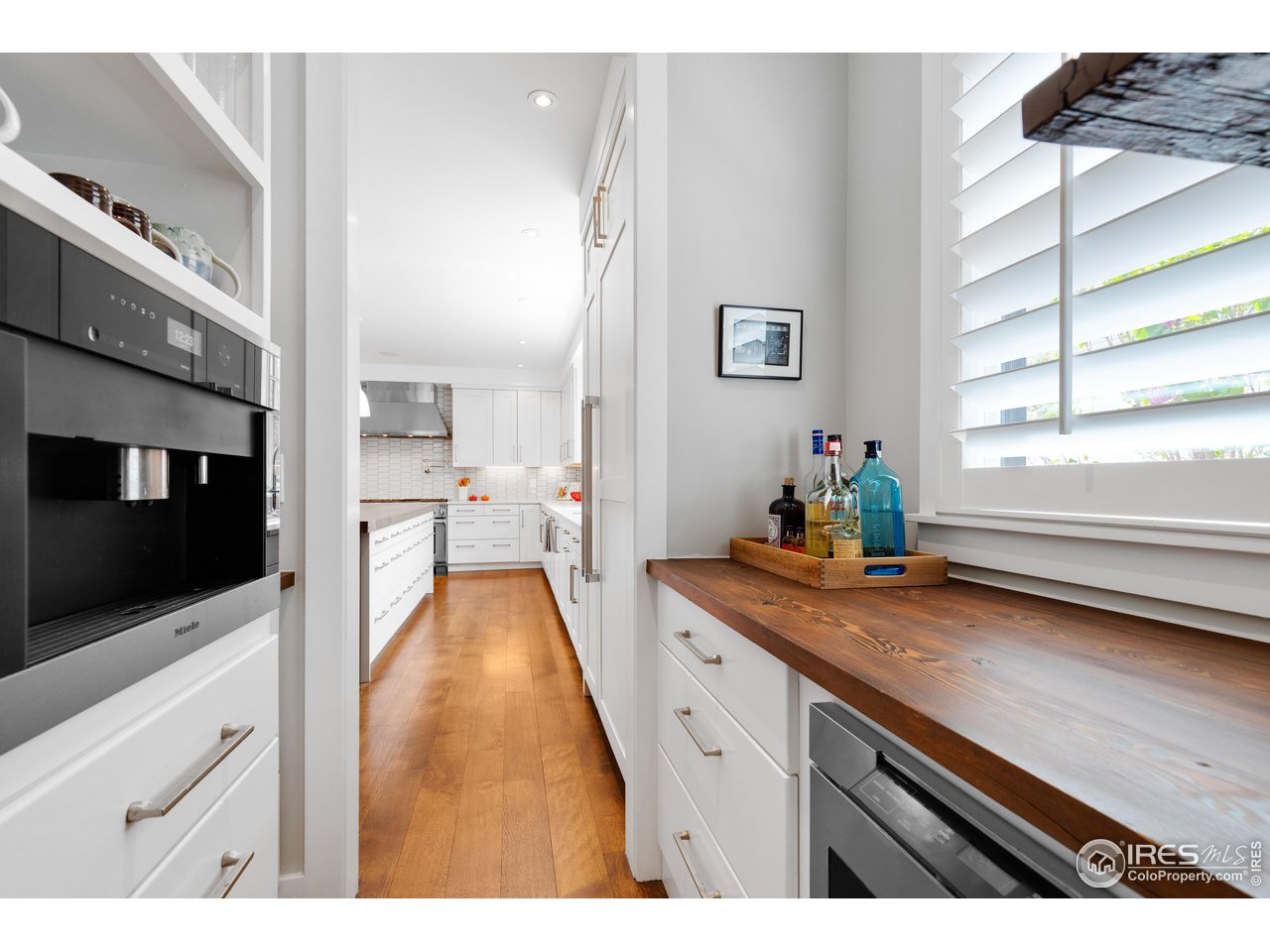 3191 9th Street Boulder, CO 80304 - Photo 5 of 40 a en suite bathroom with a granite countertop sink