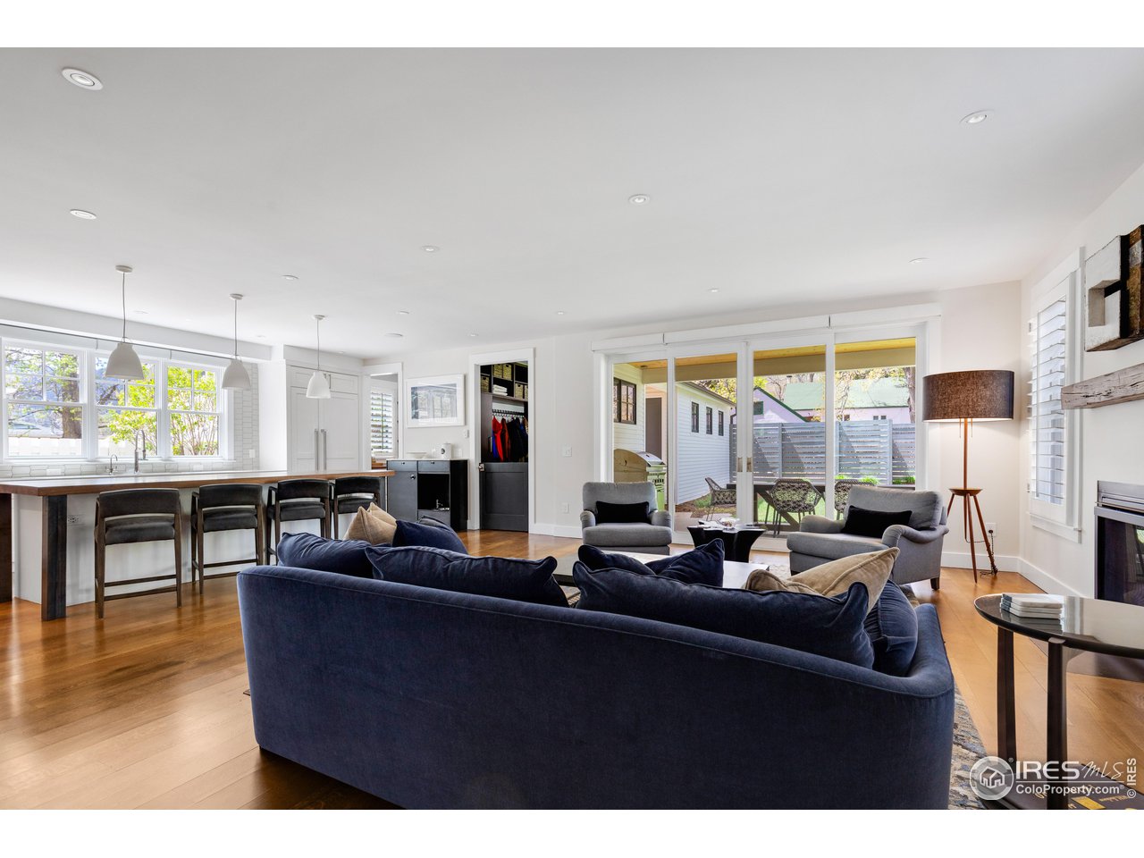 3191 9th Street Boulder, CO 80304 - Photo 6 of 40 a living room with furniture a window and kitchen view