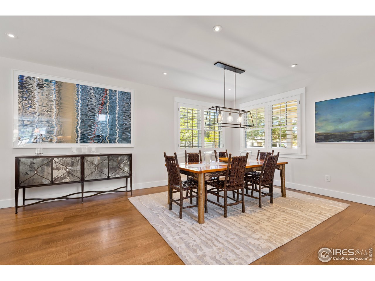 3191 9th Street Boulder, CO 80304 - Photo 8 of 40 a view of a dining room with furniture window and wooden floor