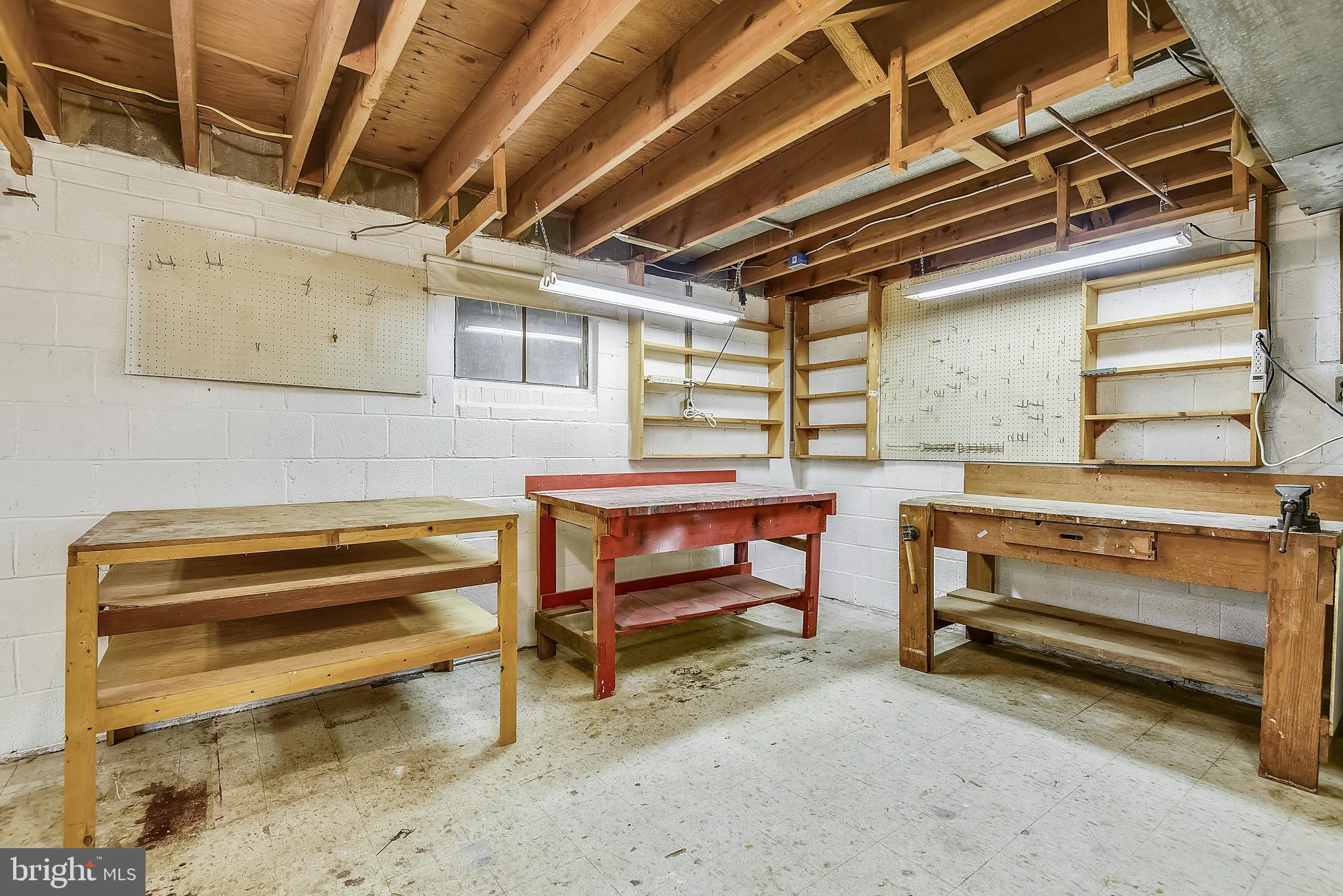 7925 Ellet Road Springfield, VA 22151 - Photo 45 of 58 Workshop tables.