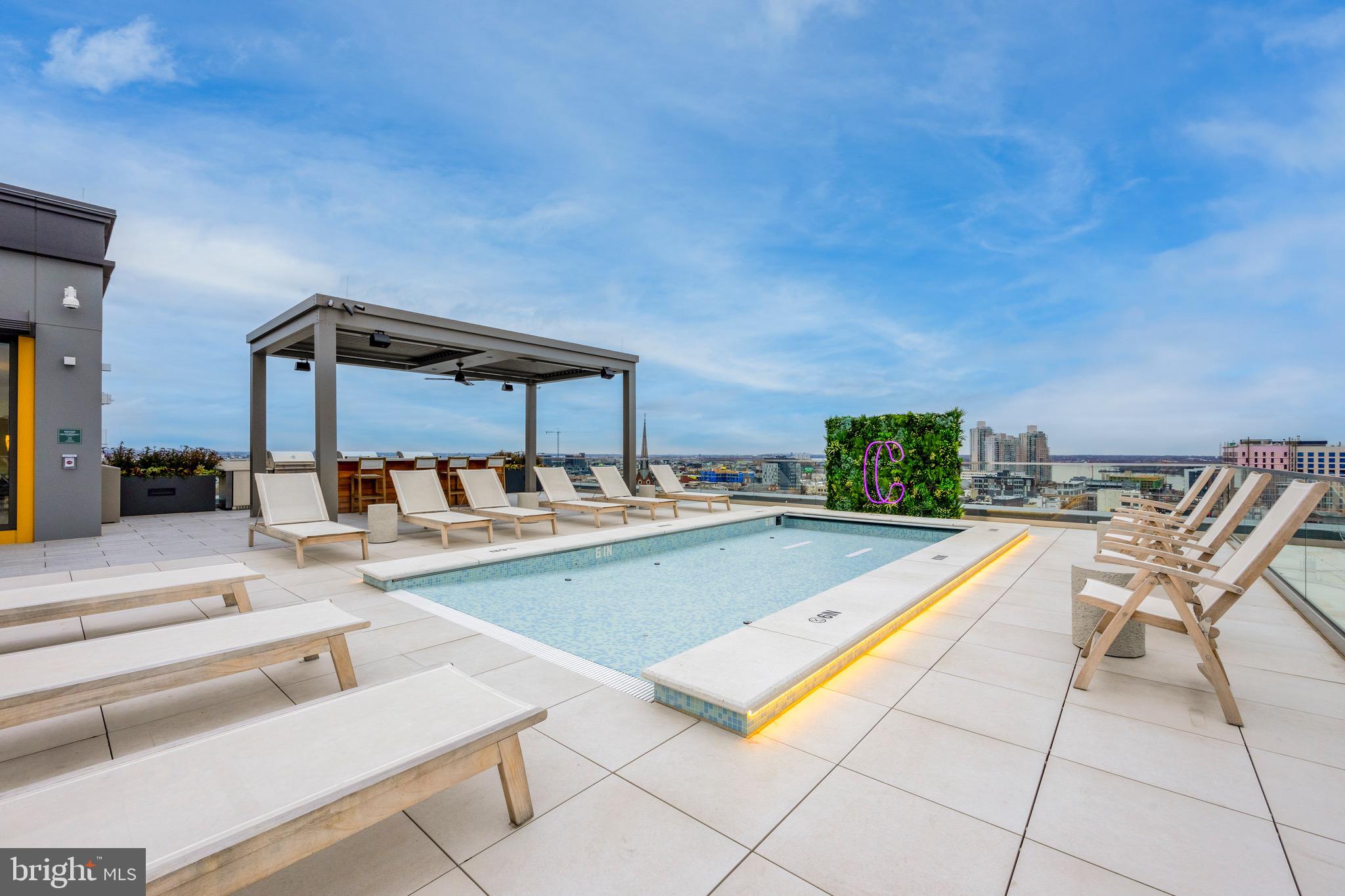 569 North 5th Street, Unit 308 Philadelphia, PA 19123 - Photo 23 of 46 a view of a patio with a table and chairs