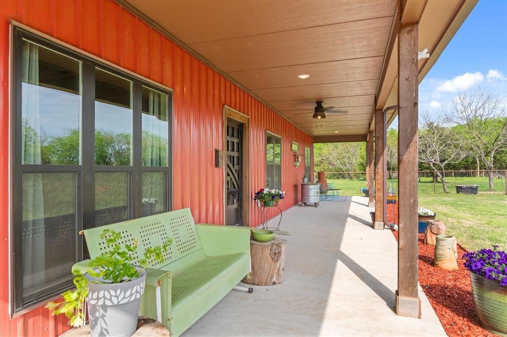 9292 County Road 346 Terrell, TX 75161 - Photo 11 of 40 a balcony with furniture and garden view