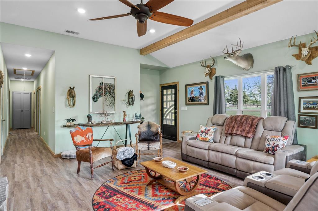 9292 County Road 346 Terrell, TX 75161 - Photo 14 of 40 a living room with furniture and wooden floor