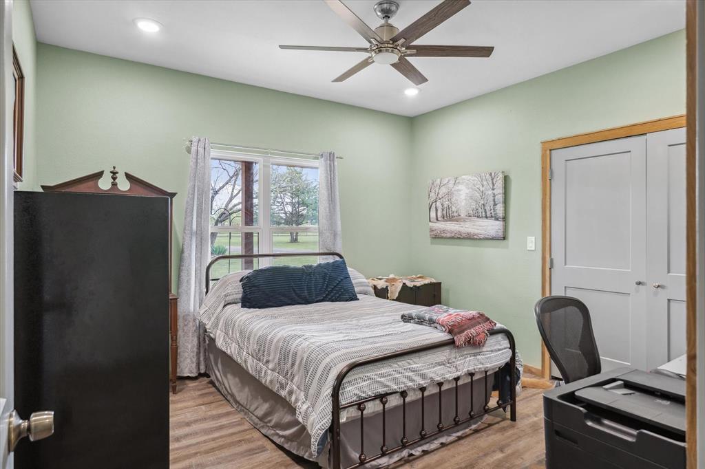 9292 County Road 346 Terrell, TX 75161 - Photo 23 of 40 a bedroom with a bed and a window