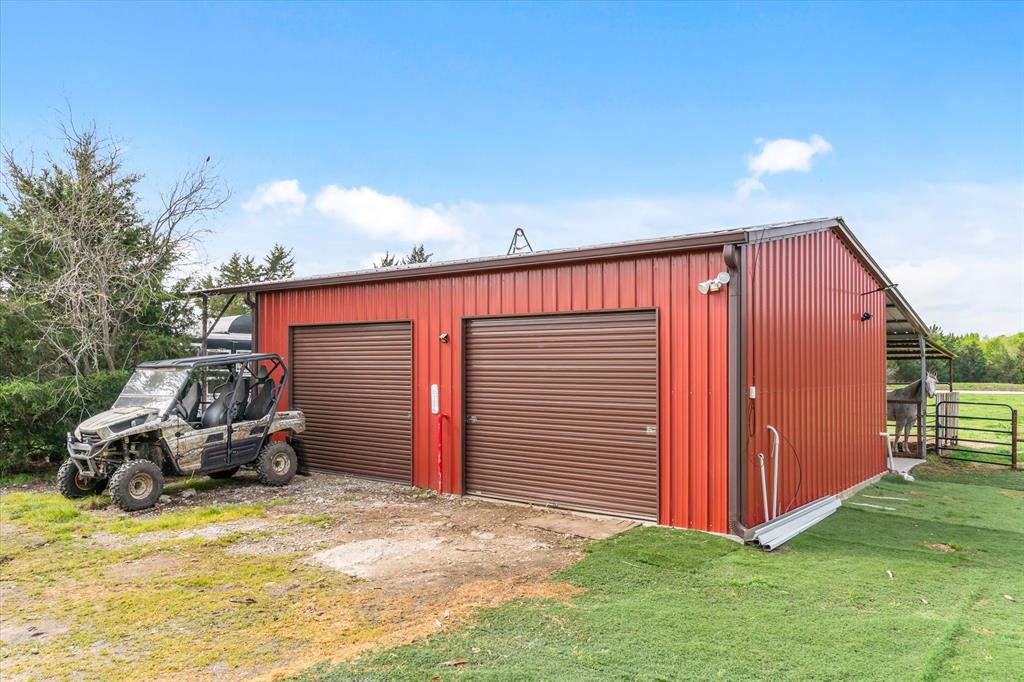 9292 County Road 346 Terrell, TX 75161 - Photo 33 of 40 a view of a house with backyard
