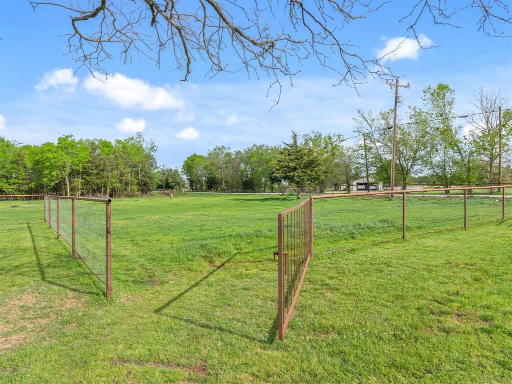 9292 County Road 346 Terrell, TX 75161 - Photo 36 of 40 a view of a golf course with a play ground